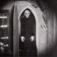 XXV